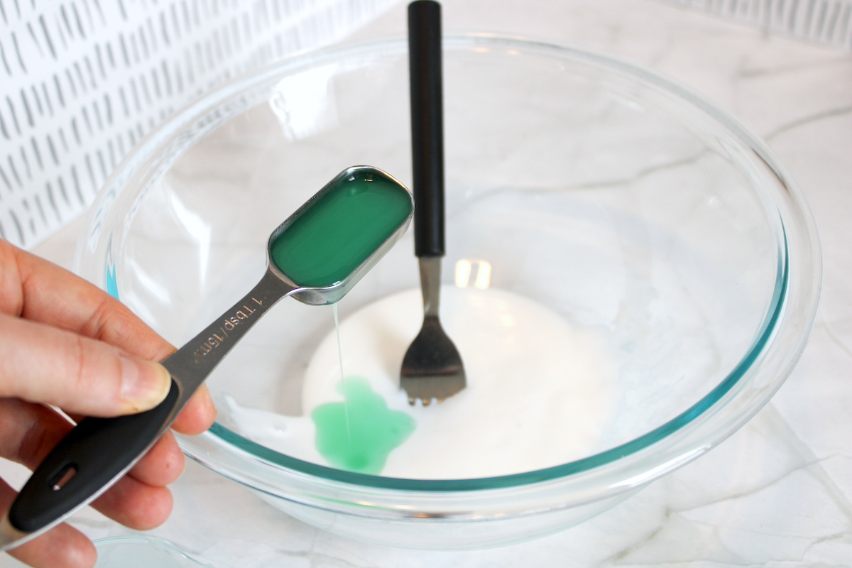 Adding laundry detergent to the glue