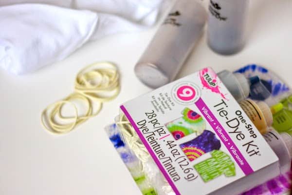 White t-shirt, rubber bands, and Tulip one step tie dye kit