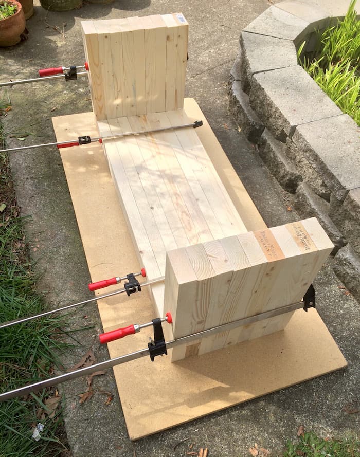 Final bench assembled and held together to dry with clamps