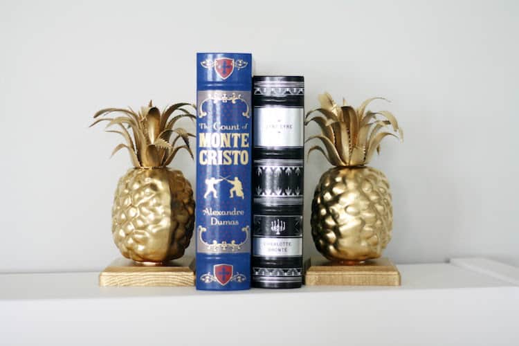 Learn how to make these simple, custom pineapple DIY bookends in just a few steps! The supplies are also very budget friendly.